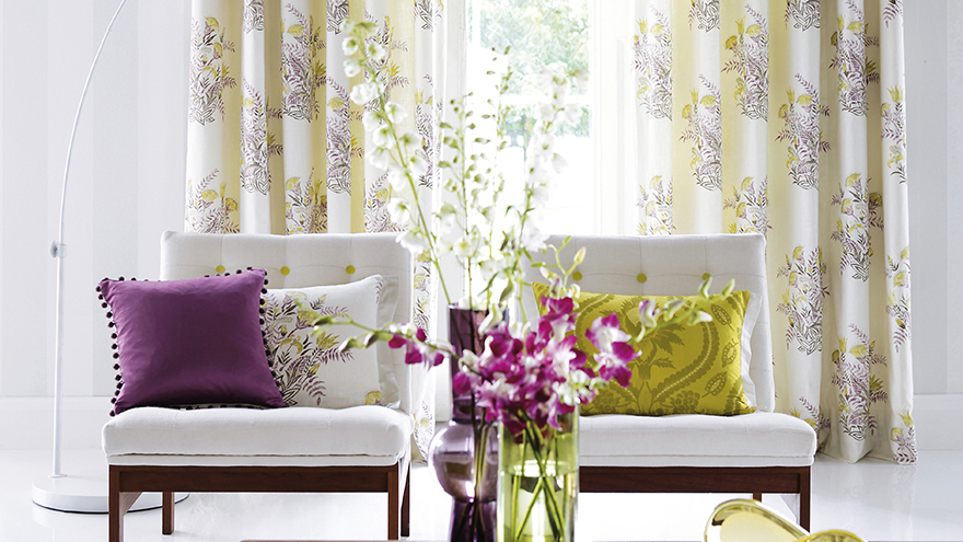 Living room with purple and green accessories Pic: Istockphoto