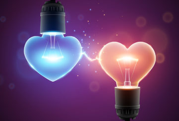 Two glowing lamps in heart shapes