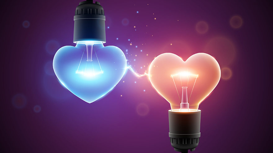 Two glowing lamps in heart shapes