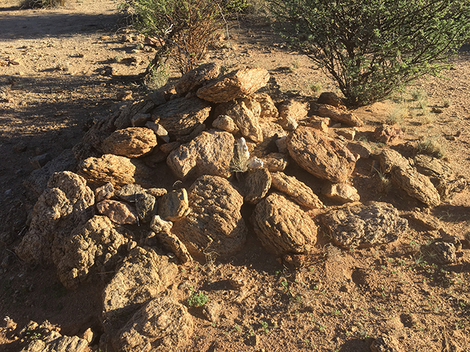 Stones in the desert denoting a grave