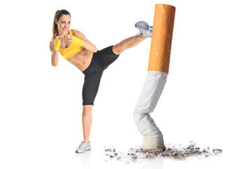 Girl kicking a cigarette butt