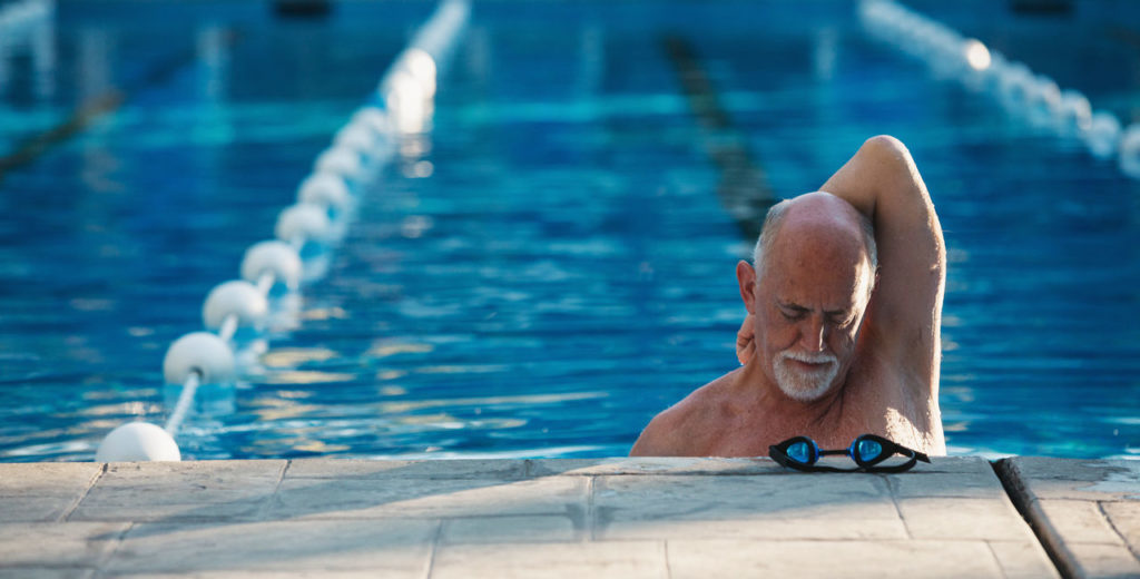 Older man in swimming pool