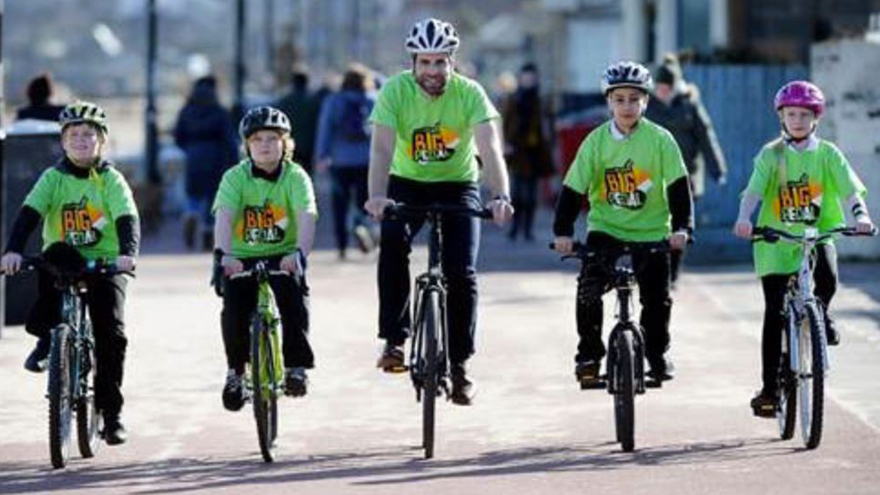 Mark and children cycling
