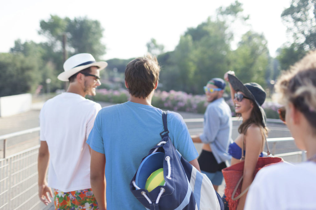 People leaving tennis court