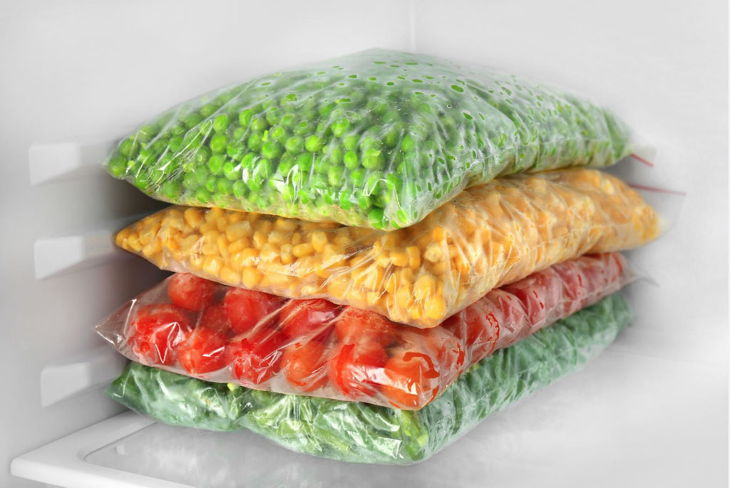 Frozen vegetables in freezer