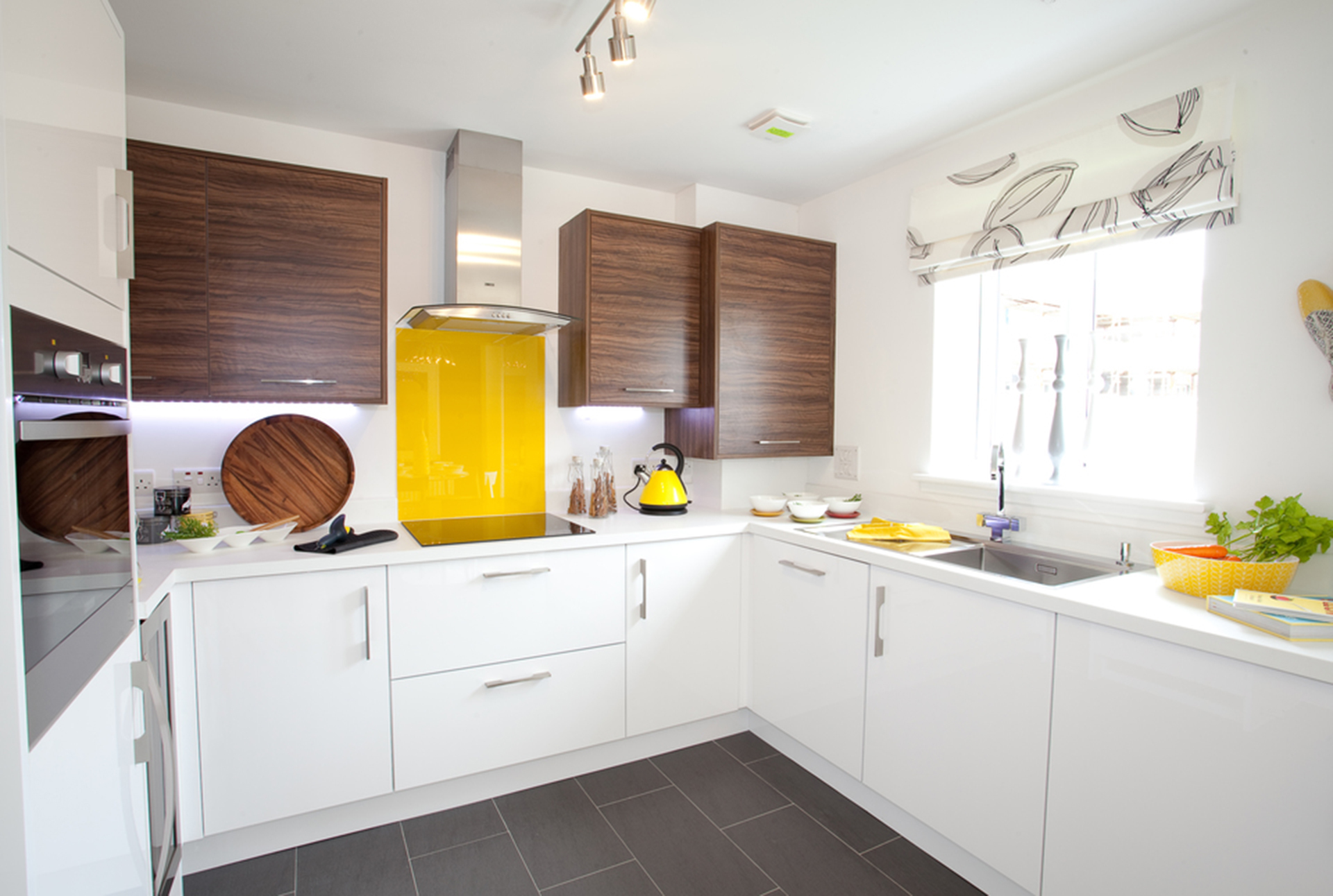 Kitchen with yellow features