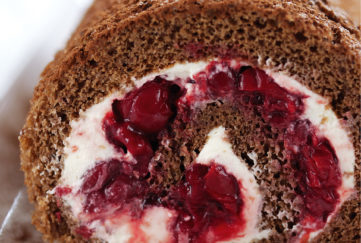 Cut end of chocolate cherry swiss roll