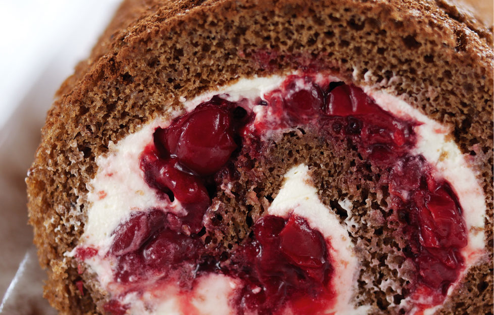 Cut end of chocolate cherry swiss roll