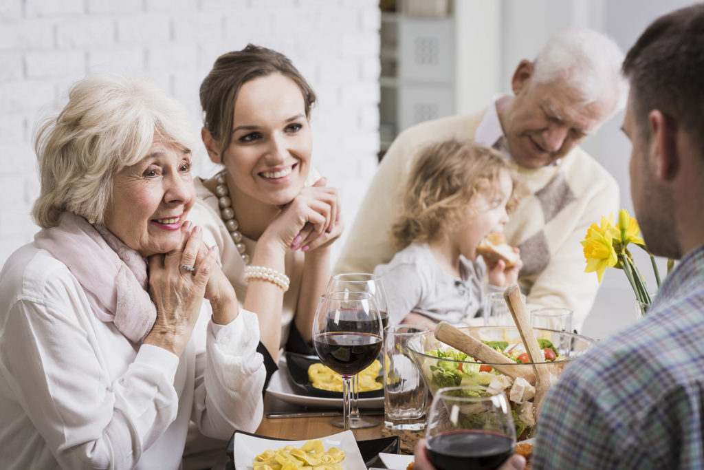 Family round a dining table