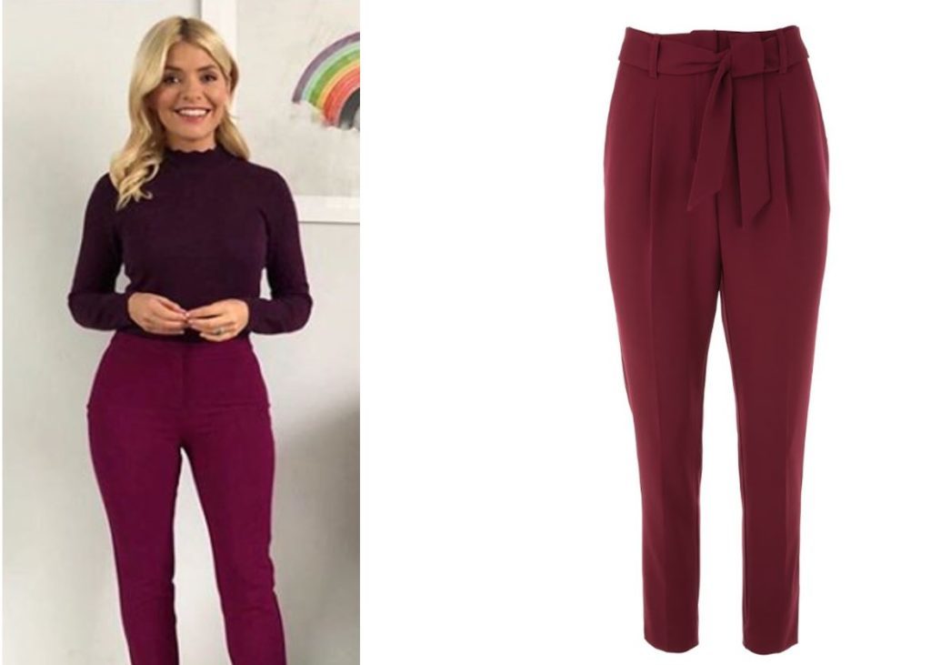 Holly Willoughby in dark red trousers