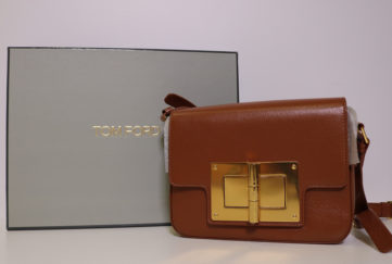 Tom Ford designer handbag, tan, square with large gold coloured hinge style buckle