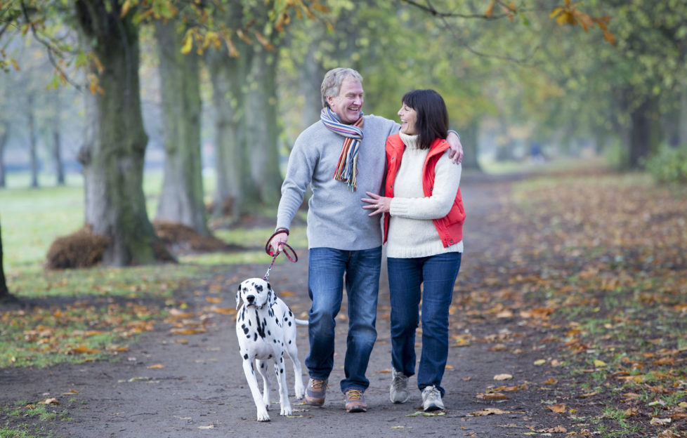 Mature Couple Walking the Dog