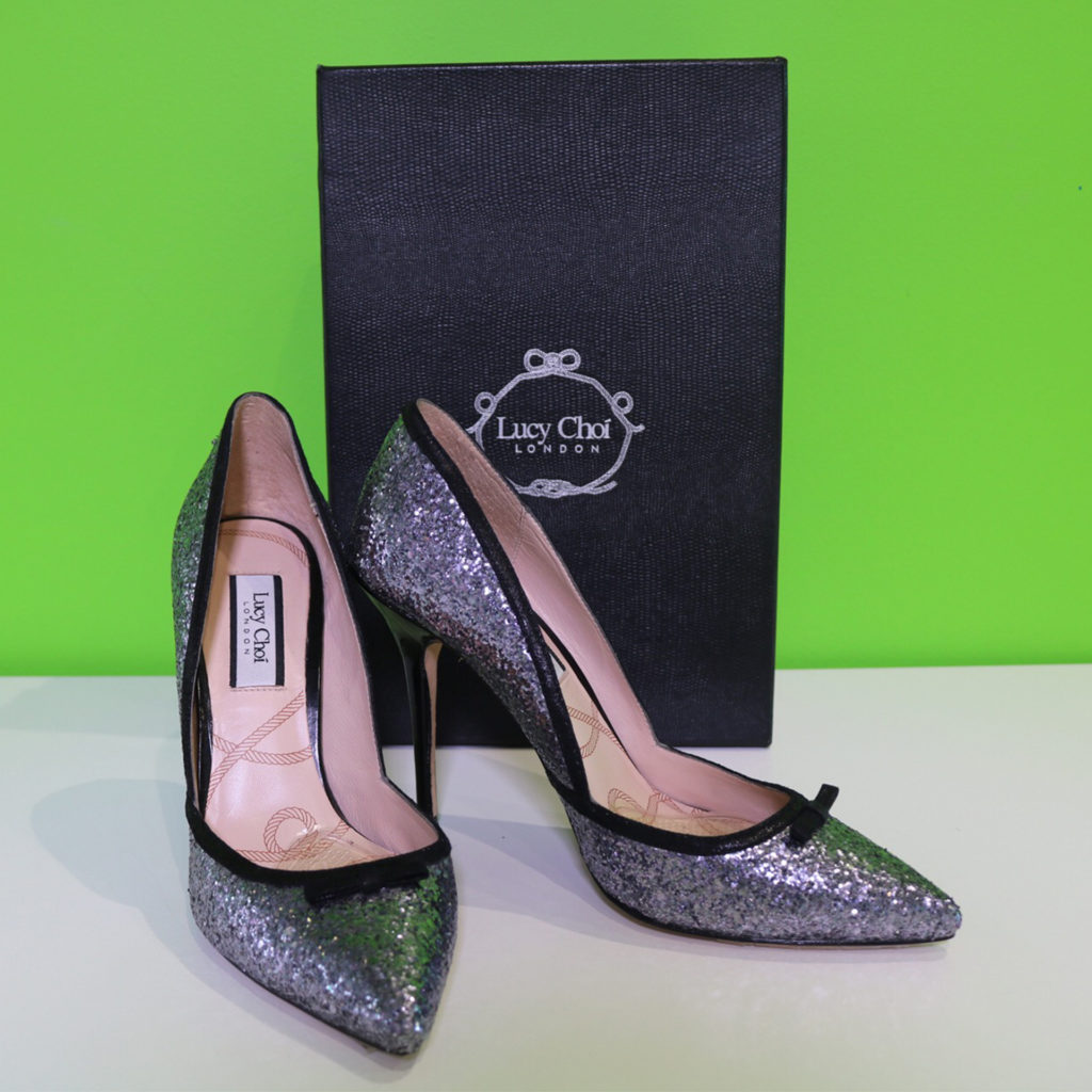 Pair of silver sequined high heeled shoes