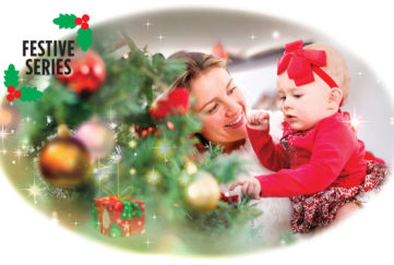Lady with baby at Christmas Tree Illustration: Istockphoto, Mandy Dixon