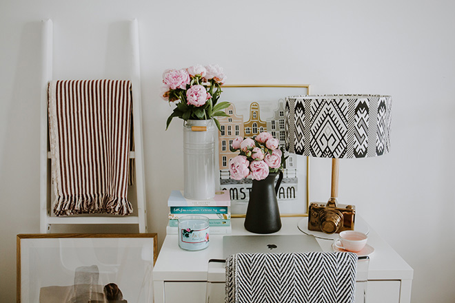 Desk and table with accessories Photo by Alisa Anton on Unsplash