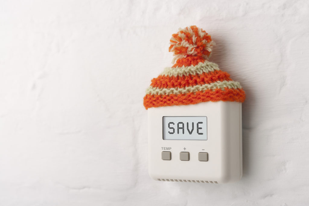 heating controls with woolly hat on top
