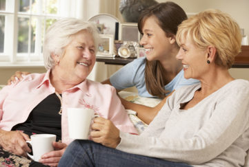 Adult Daughter With Teenage Granddaughter Visiting Grandmother Having A Chat Pic: Istockphoto