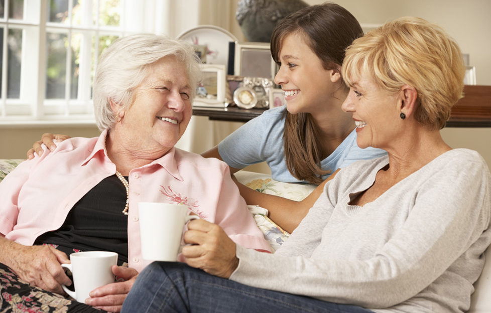 Adult Daughter With Teenage Granddaughter Visiting Grandmother Having A Chat Pic: Istockphoto