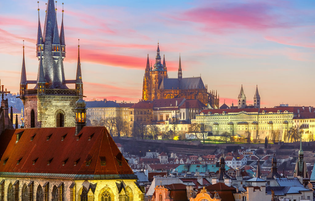 Aerial view over Old Town and Prague Castle at sunset. Top romantic destinations in Europe