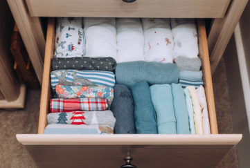 Clothes neatly folded in a drawer