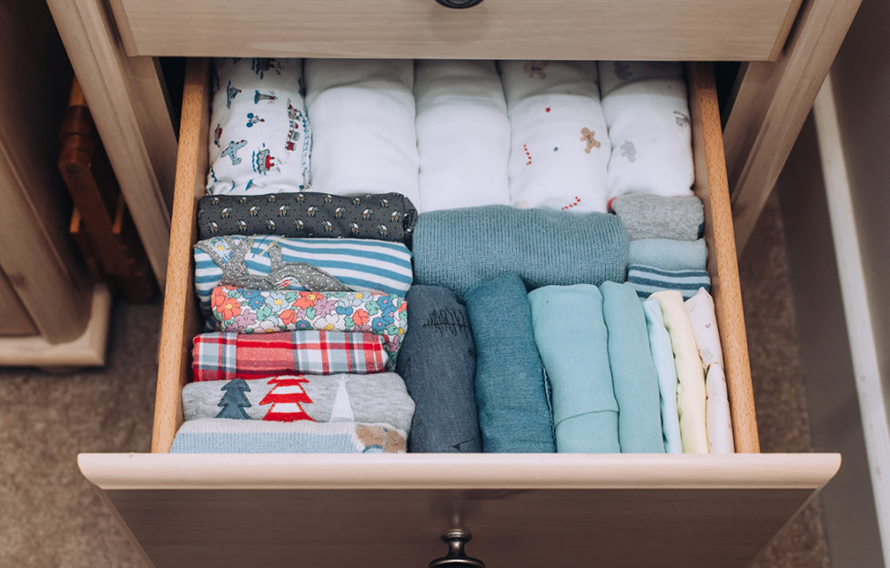 Clothes neatly folded in a drawer
