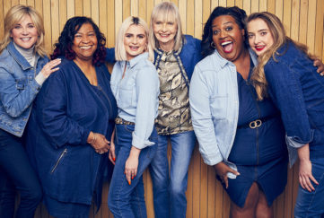 Anthea, Maria, Claudia, Jan, Alison and Daisy in blue denim clothes, all laughing