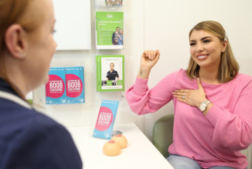 Love Island’s Olivia Buckland talks to a nurse during a breast check consultation at a Superdrug CoppaFeel! hub Pic: Isabel Infantes/PA Wire