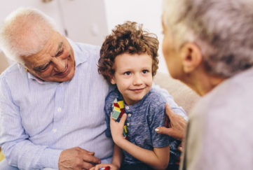 Young boy with his grandparents Pic: Istockphoto