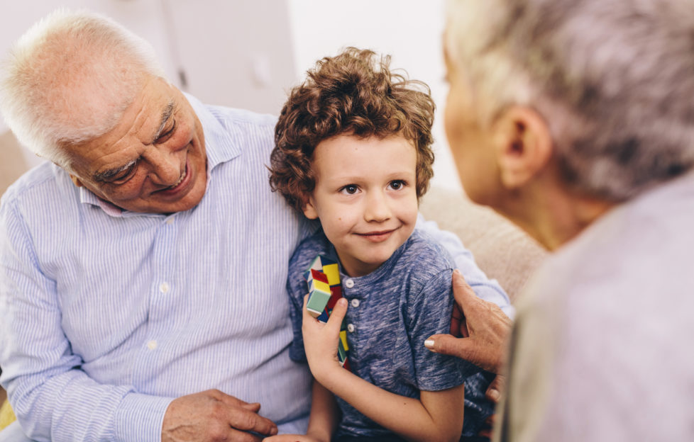Young boy with his grandparents Pic: Istockphoto