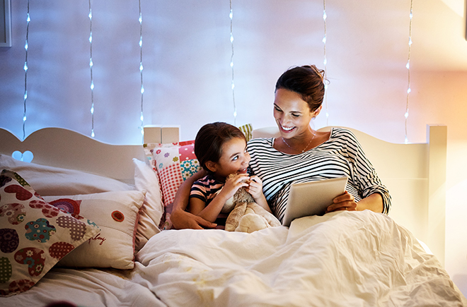 Mum and child reading bedtime story Pic: Istockphoto