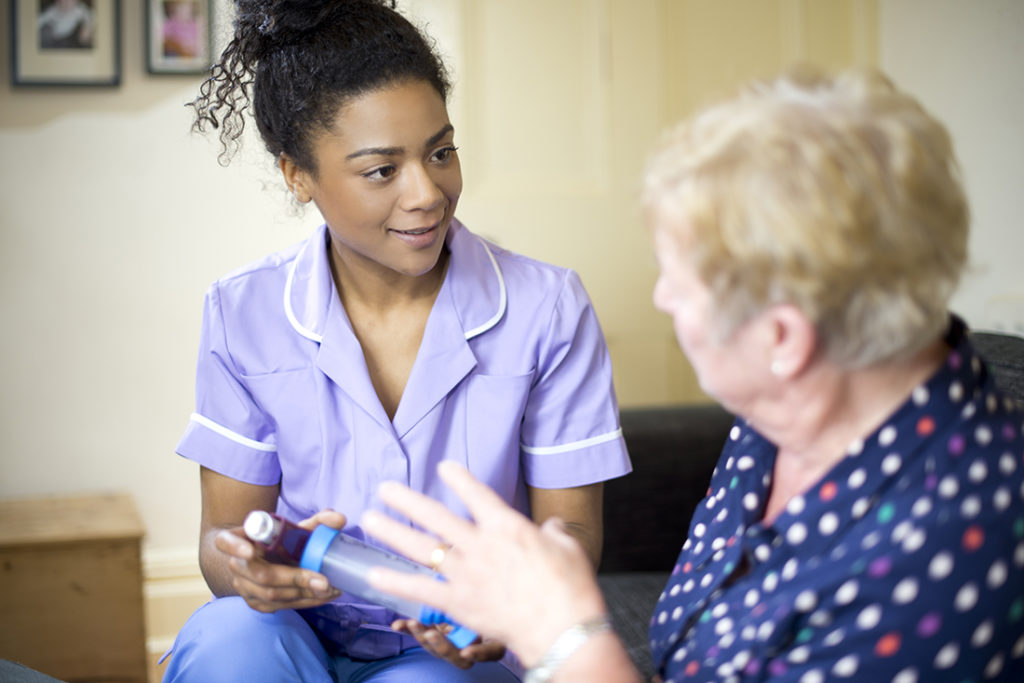 Mature lady getting advice from nurse Pic: Istockphoto