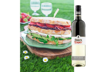 Tricoloured sandwich and Black Tower Fruity White Wine