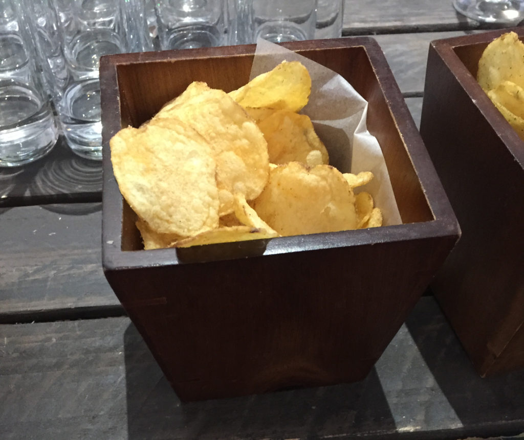 Crisps in a brown bowl