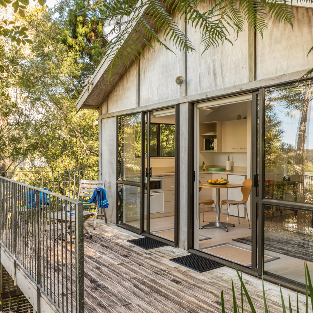 Luxury lodge with veranda among treetops