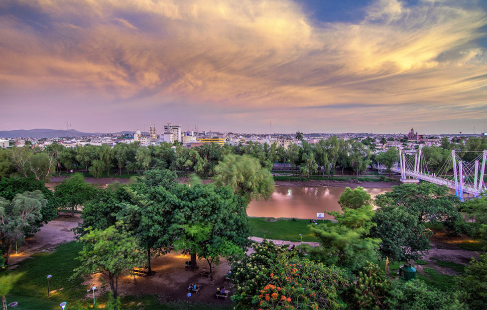 Culiacan, Mexico under a lilac evening sky. One of the top places to explore on foot