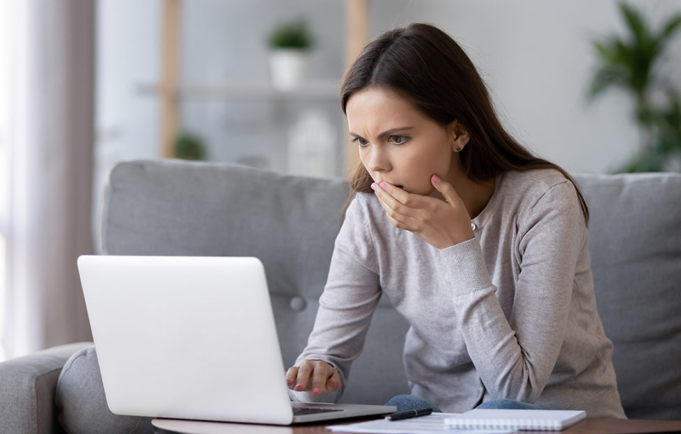 A lady worried after accessing bank details online Pic: Istockphoto