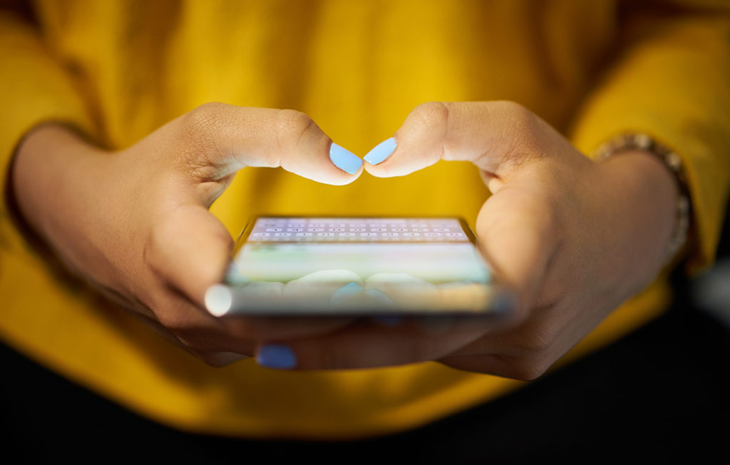 Woman typing social media post Pic: Istockphoto