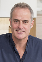 Portrait shot of celebrity chef Phil Vickery in dark blue shirt