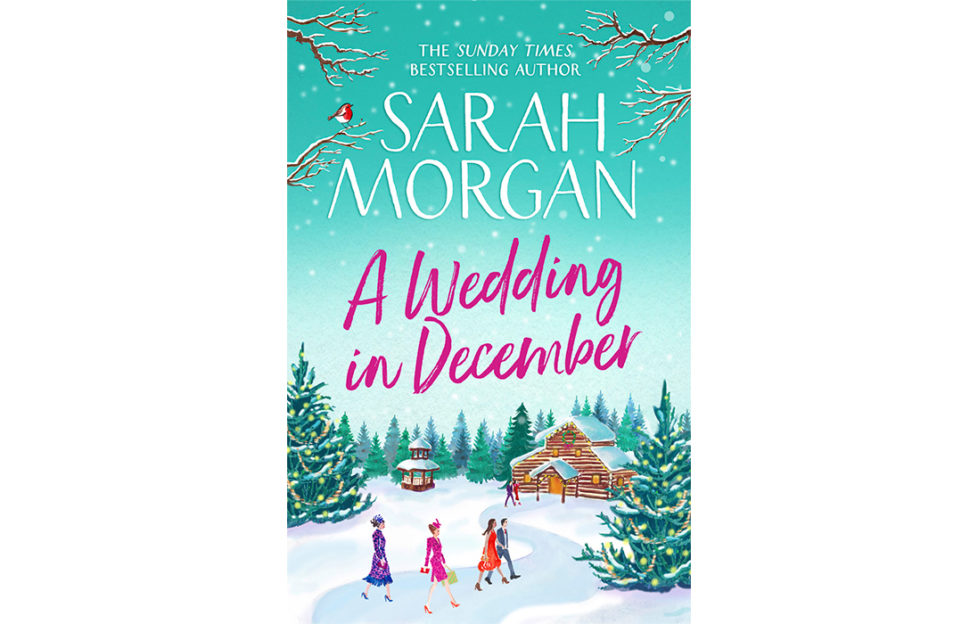 Cover of A Wedding In December. A couple and two women in wedding outfits are following a path through the snow to a log cabin. Large pine trees are decorated with lights.