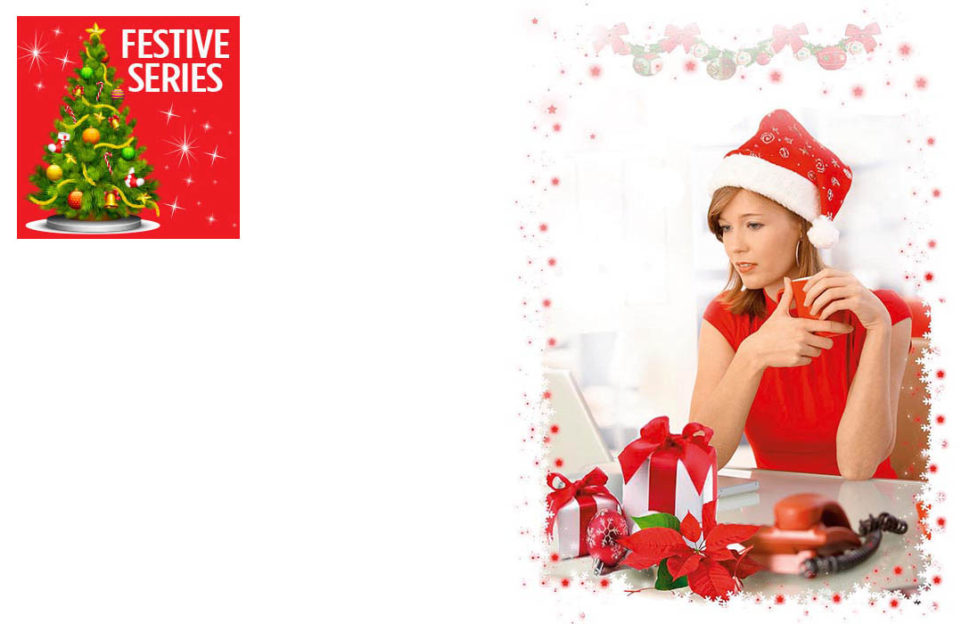 Woman in red dress and Santa hat, at desk with red phone and several wrapped gifts, staring glumly at computer screen