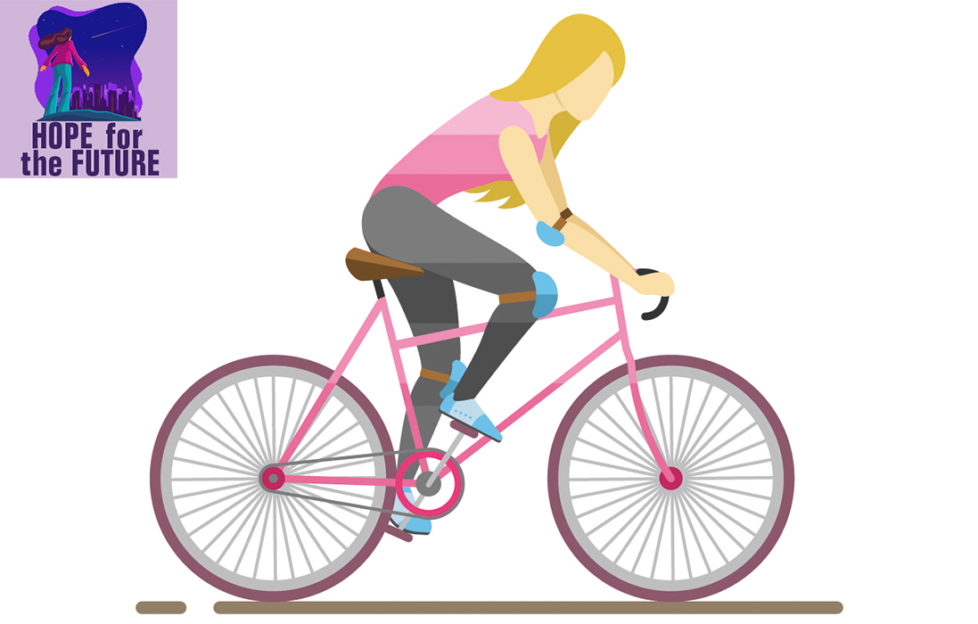 Vector image of a woman in pink and grey sports gear cycling as fast as she can