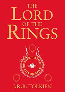 Cover of Lord Of The Rings, gold letters on red, circular illustration with eye and flames