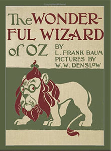 Cover of The Wizard Of Oz first edition, illustration of cowed looking lion in glasses