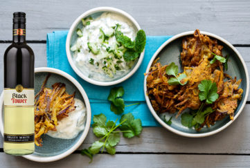 Onion bhajis with a bottle of white wine