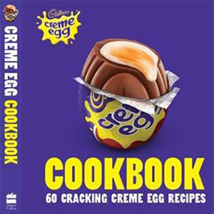 Cover of Cadbury Creme Egg Cookbook, purple background, yellow lettering and large image of creme egg with top bitten off showing liquid centre