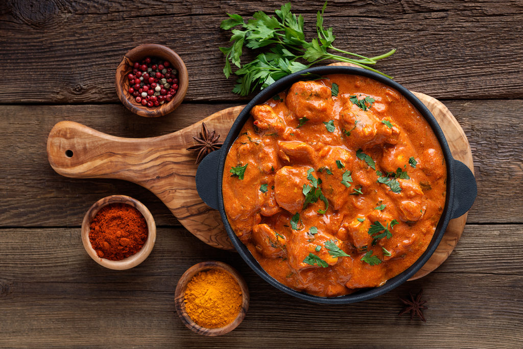 Tasty butter chicken curry dish from Indian cuisine.; 