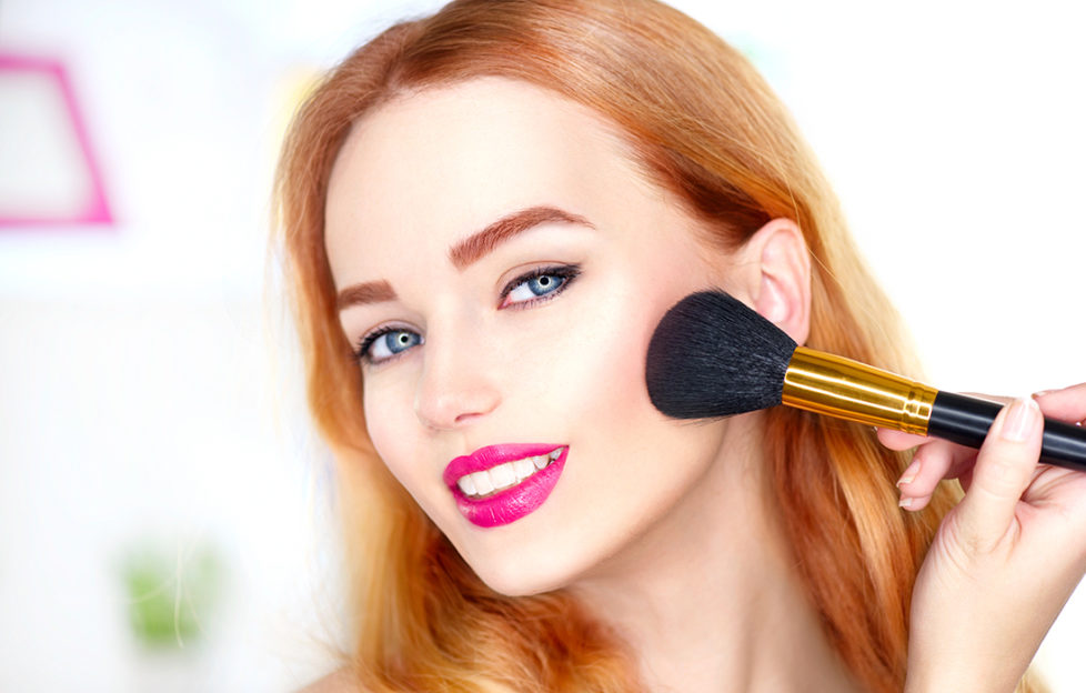 Woman applying blusher Pic: Shutterstock