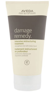 Tube of Aveda Damage Remedy, cream with dark brown stripe