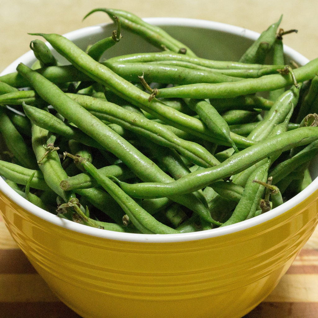 Green beans in a yellow bowl