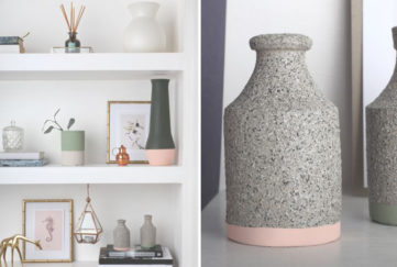 A selection of stone vases on a shelf